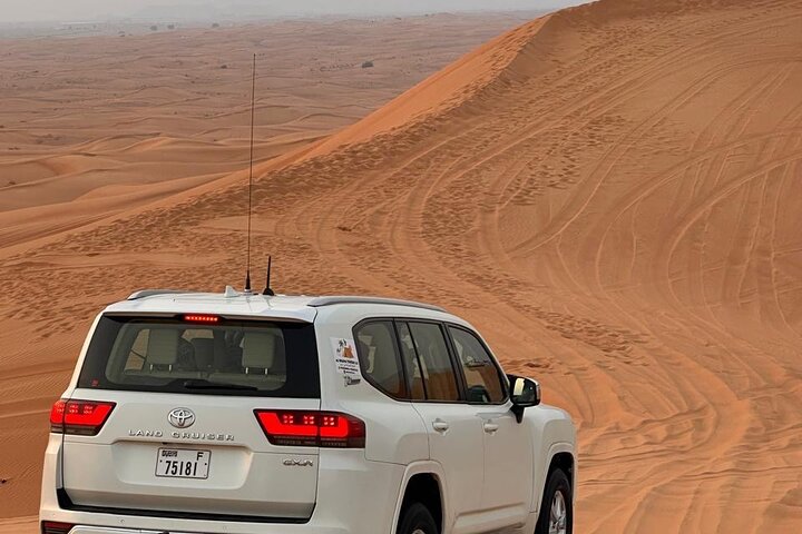 Evening Desert Safari Dubai with Camel Ride & BBQ dinner