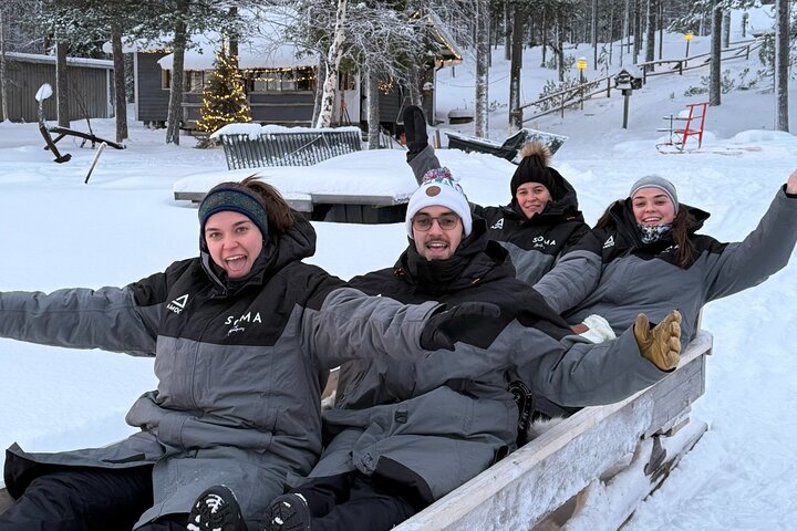 Reindeer Husbandry with Snowmobile Sleigh Ride and Cabin Lunch