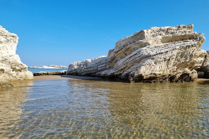 Shared boat tour in Vieste with bathing stop