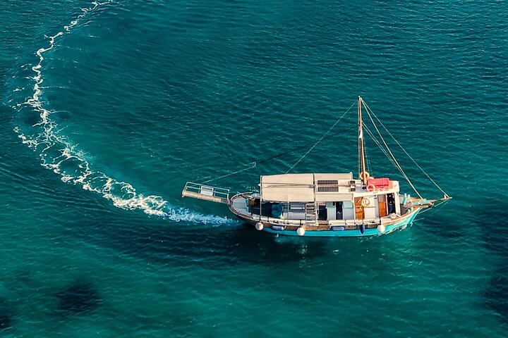 Antiparos & Despotiko Kaiki Cruise — Coves, Swim & BBQ