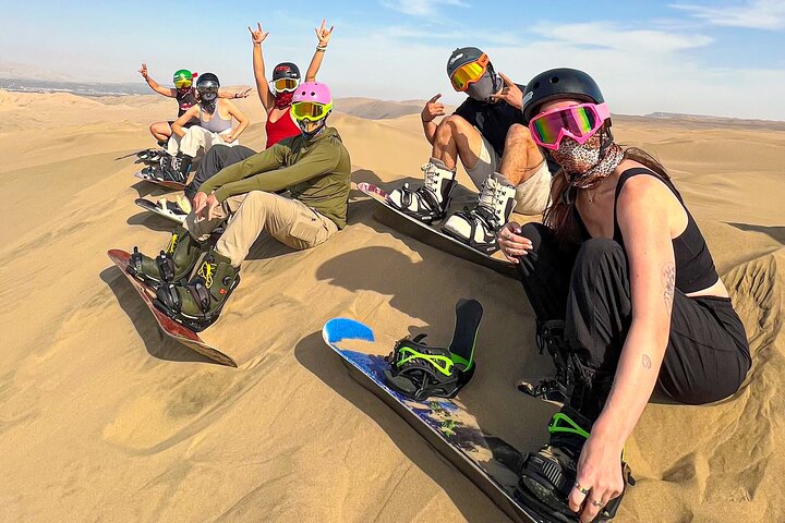 The real Sandboard,Sandski Experience, sunset,buggy and bonfire