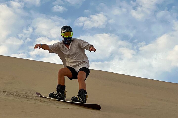 The real Sandboard,Sandski Experience, sunset,buggy and bonfire