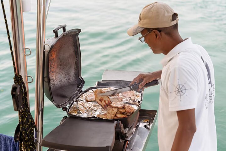 Santorini Classic Catamaran Cruise with BBQ, Drinks and Transfers