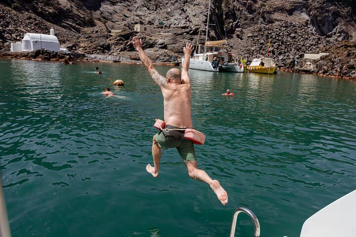 Santorini Classic Catamaran Cruise with BBQ, Drinks and Transfers