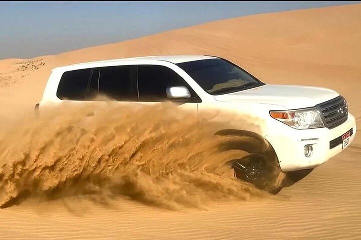 Abu Dhabi Desert Safari with Red Dunes 4x4 Pick Drop Dinner Shows