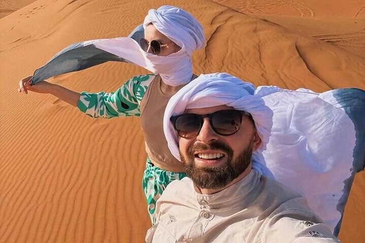 Abu Dhabi Desert Safari with Red Dunes 4x4 Pick Drop Dinner Shows