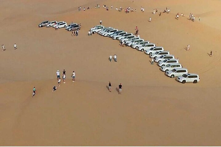 Abu Dhabi Desert Safari with Red Dunes 4x4 Pick Drop Dinner Shows