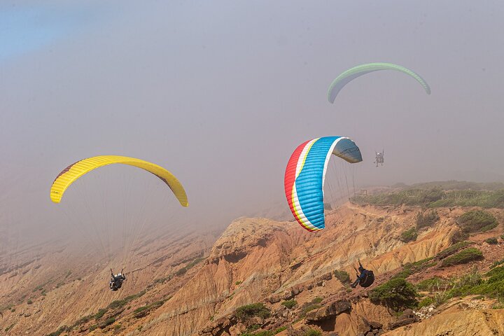 Coast, Mountains & Sunset Paragliding Experience