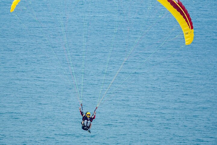 Coast, Mountains & Sunset Paragliding Experience