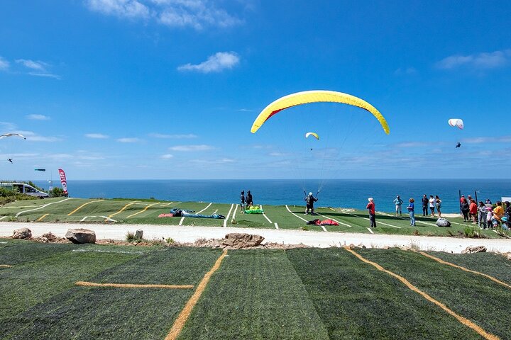 Coast, Mountains & Sunset Paragliding Experience