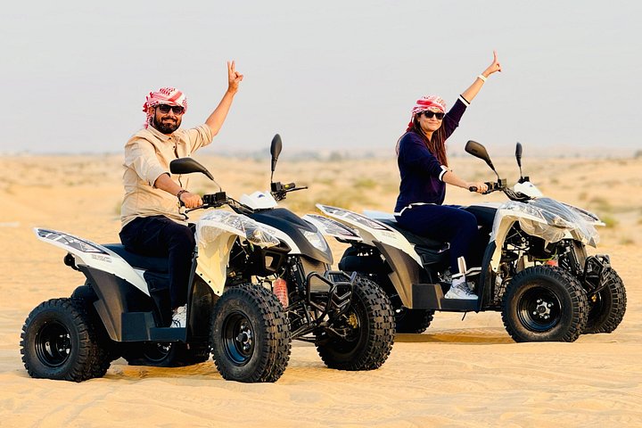 Desert Safari Abu Dhabi with Quad Bike, BBQ Dinner & Camel Ride