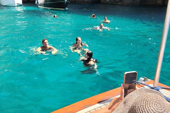 Capri: Boat tour of the caves with swim and Limoncello tasting!