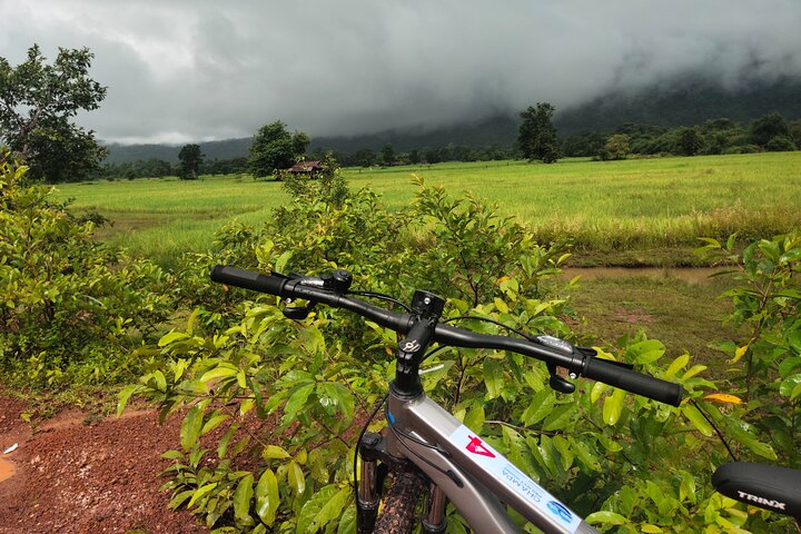 Discover Champasak’s Lush Landscapes and Ancient History by Bike