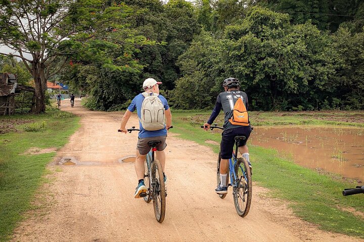 Discover Champasak’s Lush Landscapes and Ancient History by Bike