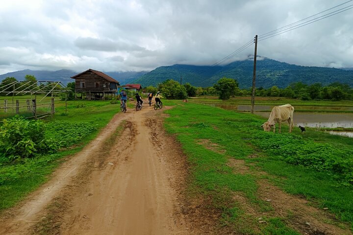 Discover Champasak’s Lush Landscapes and Ancient History by Bike