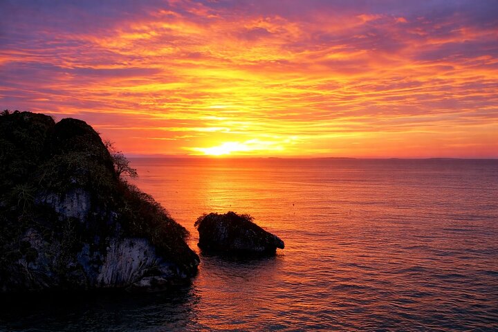 Sunset Boat Tour & Bioluminescence Adventure at Los Arcos Islands