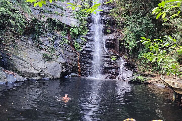 Swim and Unwind at a Scenic Waterfall from Hopkins Village