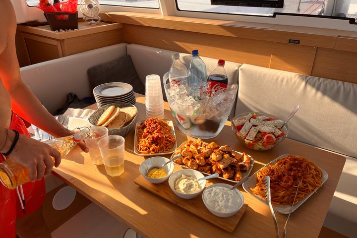 Premium Santorini Sunset Catamaran: Semi-Private, BBQ & Drinks