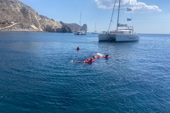 Premium Santorini Daytime Catamaran Cruise with BBQ & Open Bar