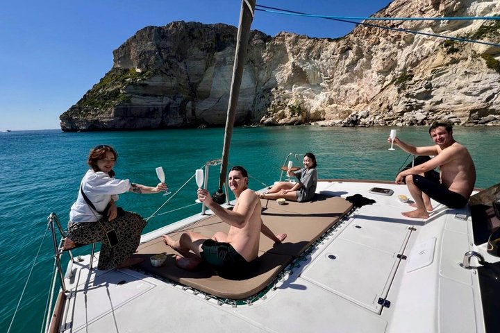Catamaran tour stops bathing and snorkeling toast with prosecco