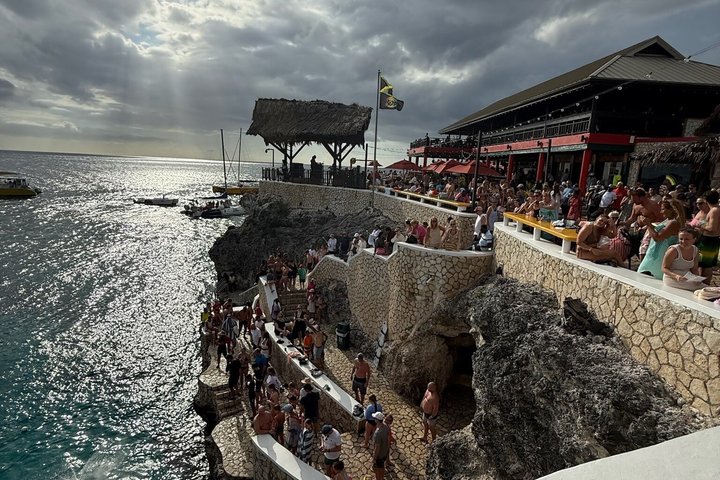 Bamboo Rafting, Catamaran Party Cruise and Ricks Cafe