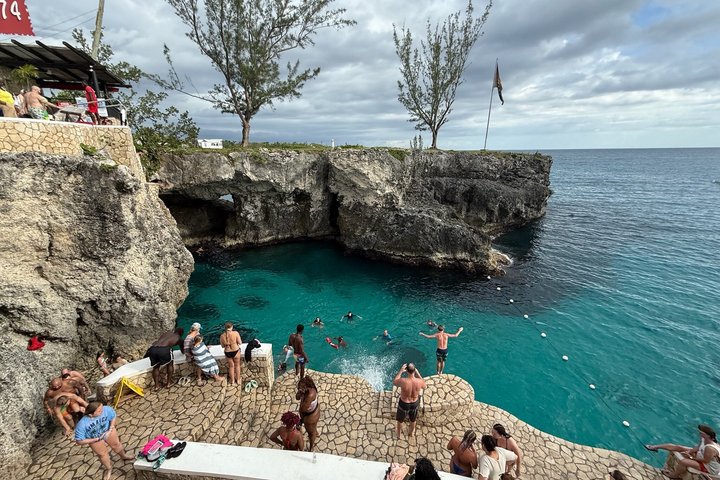 Bamboo Rafting, Catamaran Party Cruise and Ricks Cafe