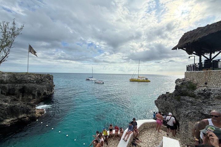Bamboo Rafting, Catamaran Party Cruise and Ricks Cafe