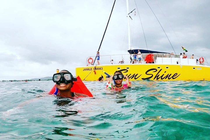 Bamboo Rafting, Catamaran Party Cruise and Ricks Cafe