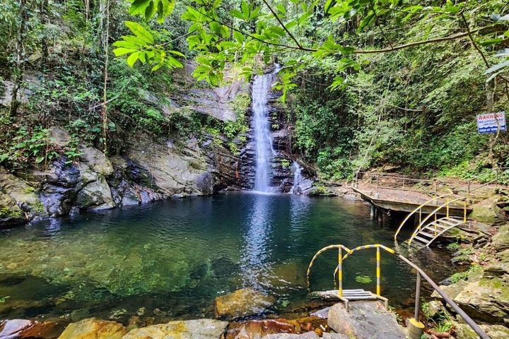 Swim and Unwind at a Scenic Waterfall from Hopkins Village