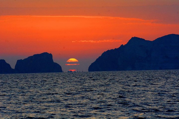 Aperitif on a boat at sunset