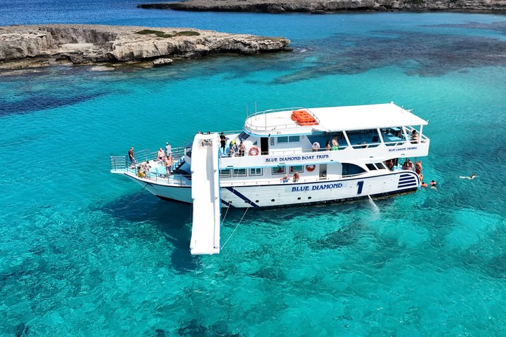 Blue Lagoon cruise: giant slide & Paphos hotel transfers