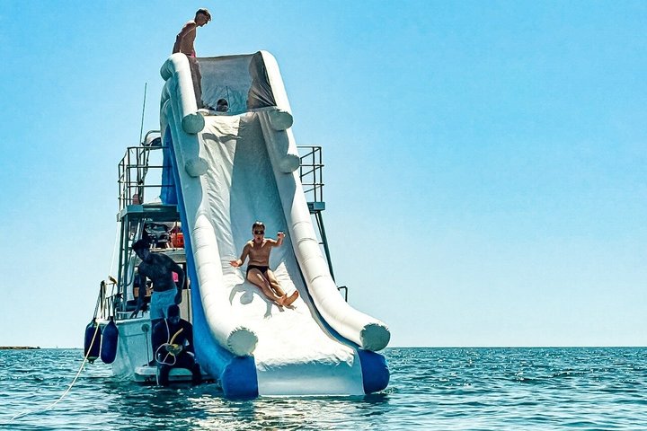 Boat Tour with Snorkeling, Slide, Lunch and Pick Up