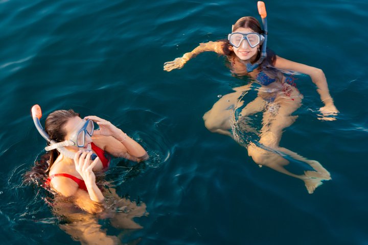 Luxury Athens Catamaran Cruise with Greek Meal & Drinks