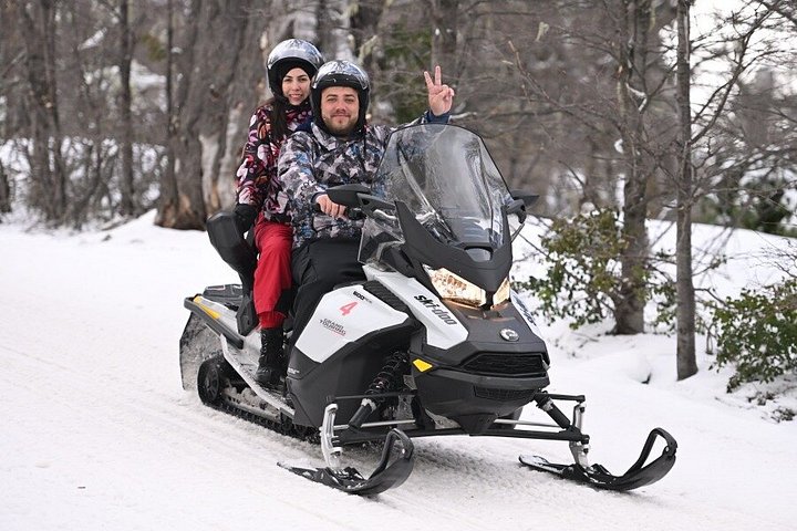 Adventure motorcycle and snow on Otto Hill
