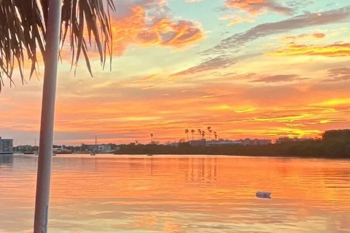 2-Hour Sunset Dolphin Tiki Boat Cruise