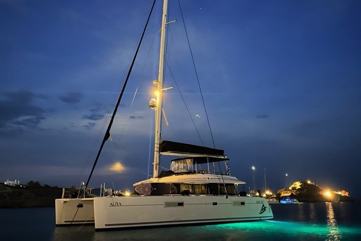 Mykonos Catamaran Sunset Cruise with Meal, Drinks & Transfer