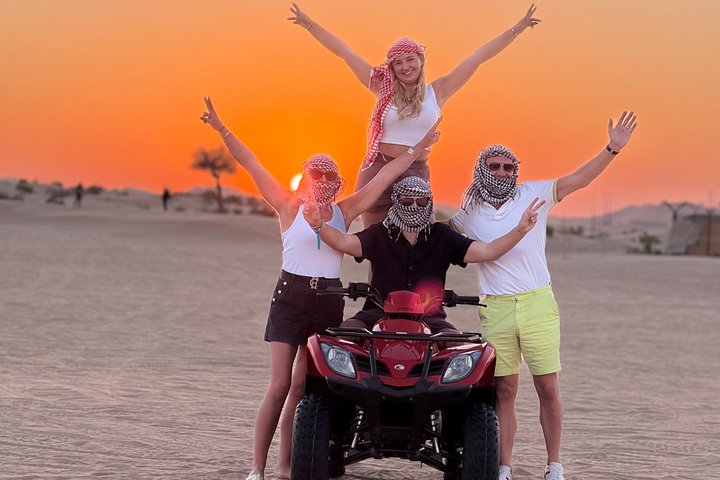 Desert Safari Abu Dhabi with Quad Bike, BBQ Dinner & Camel Ride