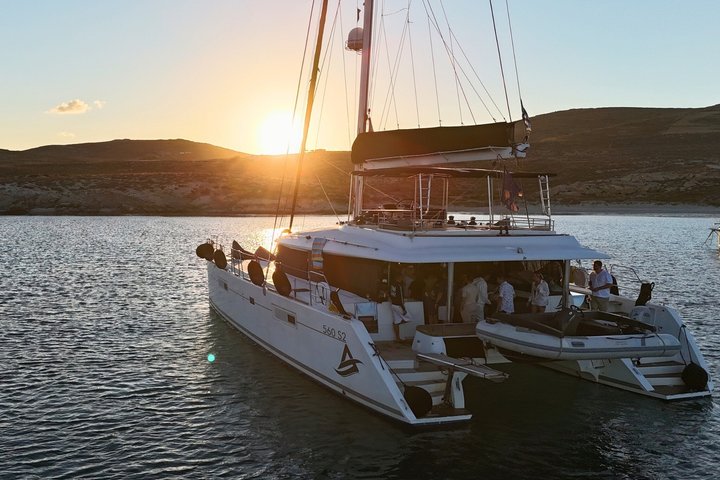 Mykonos Catamaran Sunset Cruise with Meal, Drinks & Transfer