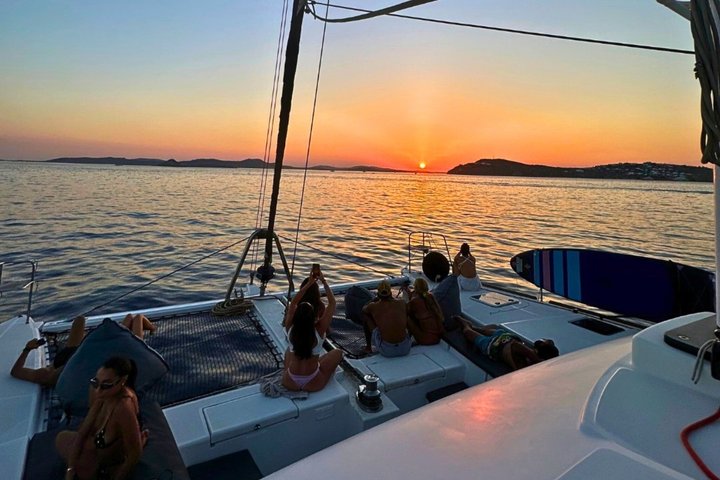 Mykonos Catamaran Sunset Cruise with Meal, Drinks & Transfer