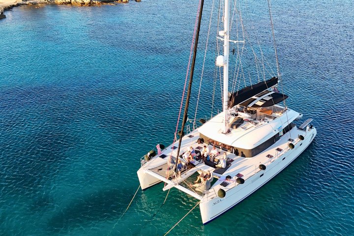 Mykonos Catamaran Sunset Cruise with Meal, Drinks & Transfer