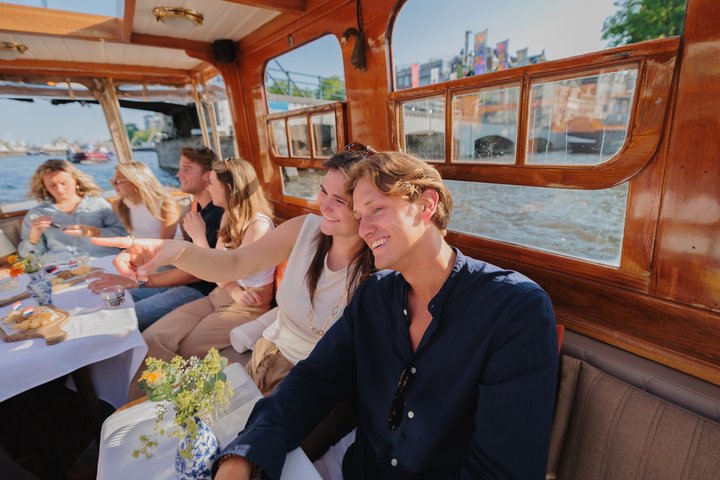Amsterdam Classic Saloon Boat Cruise with Drinks and Cheese