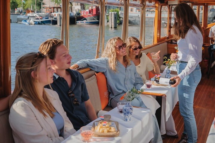 Amsterdam Classic Saloon Boat Cruise with Drinks and Cheese