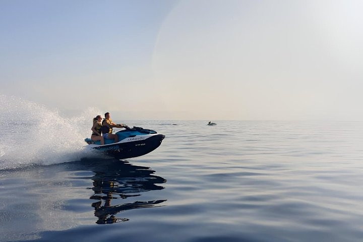 A day at sea in Cala Blanca with paella and jet ski
