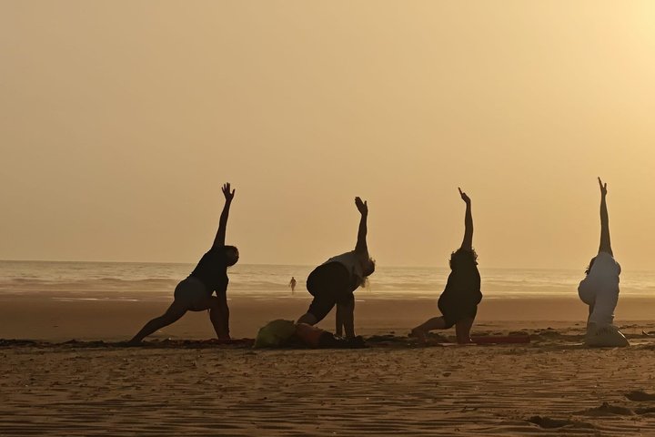 Yoga at sunrise and sunset on Berria Beach