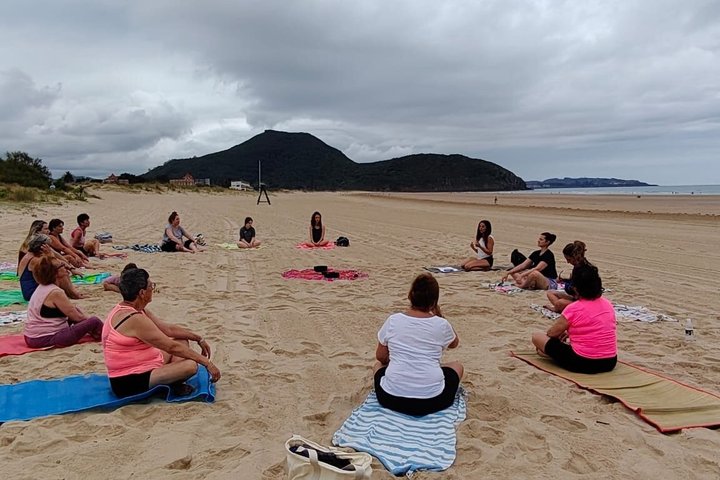 Yoga at sunrise and sunset on Berria Beach