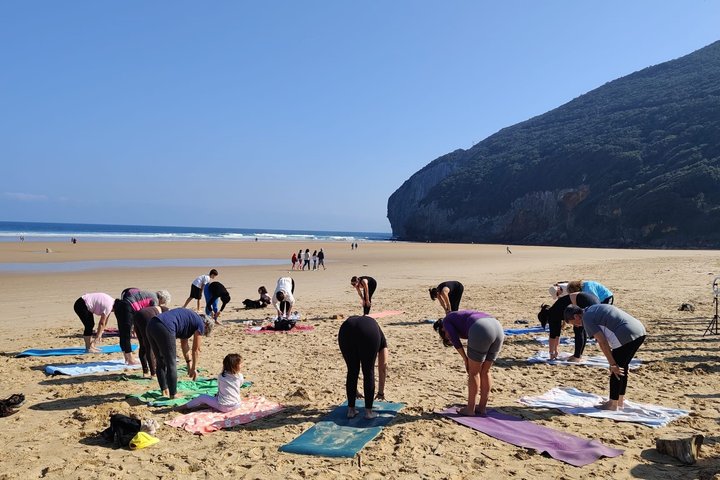 Yoga at sunrise and sunset on Berria Beach