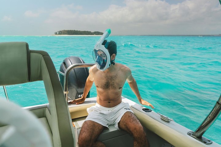 Mnemba Island Luxury Boat Tour with Dolphins and Snorkeling