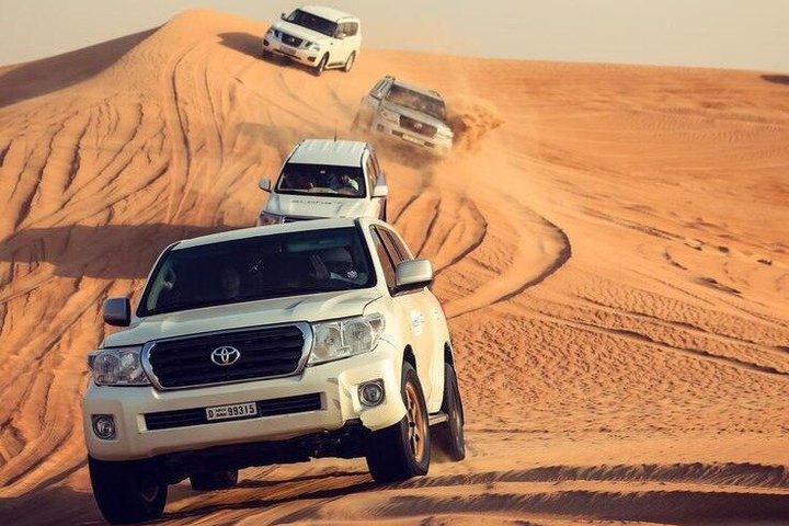 Dubai Desert Safari, Dune Bashing, Camel Ride, Sandboarding & BBQ